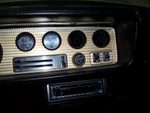 First bezel!  I did put a six speaker Kenwood system in the car.