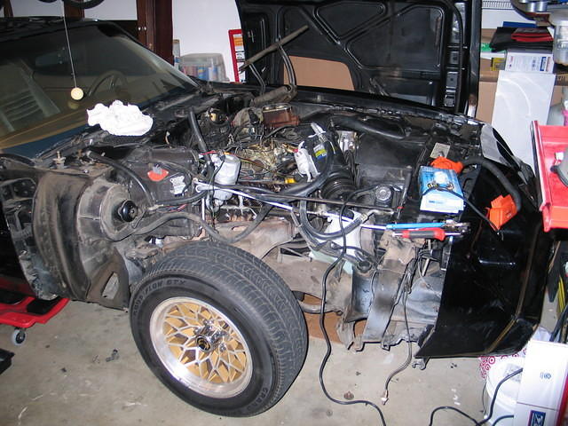 Replaced the valve cover gaskets - the wheel makes a nice seat for 4 hours!