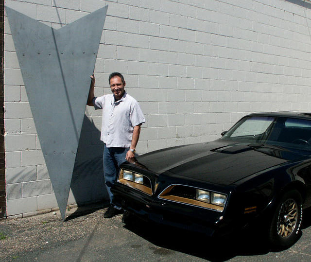 Old steel  sign from Arrow Pontiac \" someone repainted it grey, hopefully will bring it back to they way it was\"
