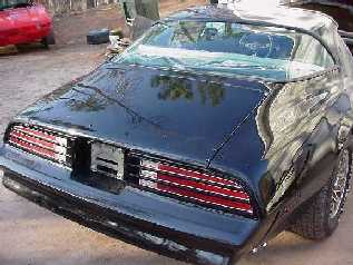 After the paint shop and ready for spoilers and new rubber seals. . . A very, BIG thank you to Dennis at allmusclecars.com who restored my Special Edition Trans Am.