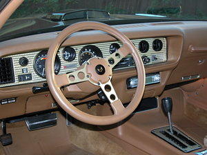 Restored dashboard and dash trim plate.