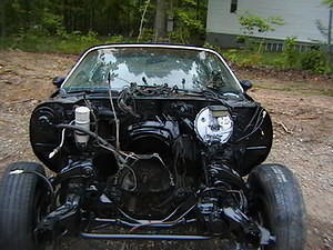 Ok I pulled the front clip...engine and trans...and stripped her to the metal...and painted it with semi-gloss black