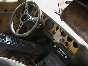 Inside As you can see the guy had Spray painted the gold dash years ago to try to get the gold to come back...but It just looks FAKE! I am going to get some of that Gold bezel tape ....And try that for a while