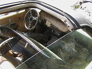 See the tops...they should be on the top...not in the car...I guess they rode to the junk yard with them out one last time?