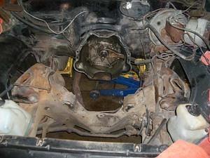 What the engine compartment looked like before...