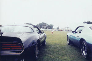 car show next to a 73 firebird