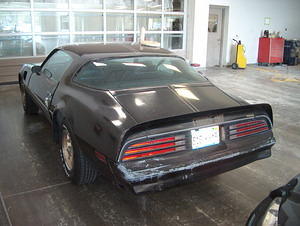 I just wanted to document what the car looked like first.  Note the bumper.  It's bad, and I'm having a tough time finding someone to restore them.