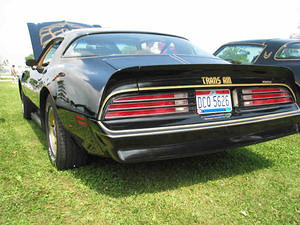 From the rear.