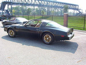 At the car show with a friend with a 1979 TA in background