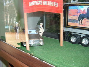 Bufford and Jr. check out the sign they hit.    HA!     A Coor's beer sign!!