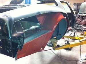 On with the new tail panel corner (inner and outer), trunk drop, trunk patch over frame bracket, outer wheel house and rocker panel patch